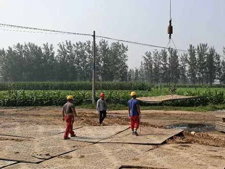 Polyethylene track roadway panel in Muddy